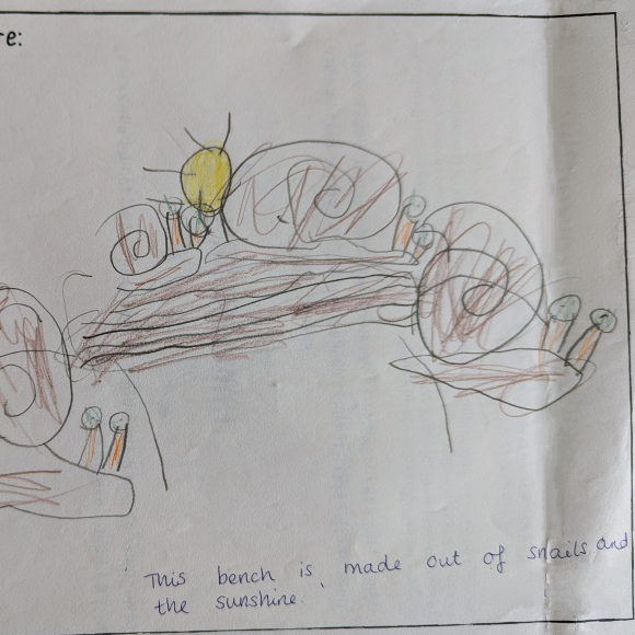 The original drawing of a bench design from one of the competition winners, featuring snails and sunshine.