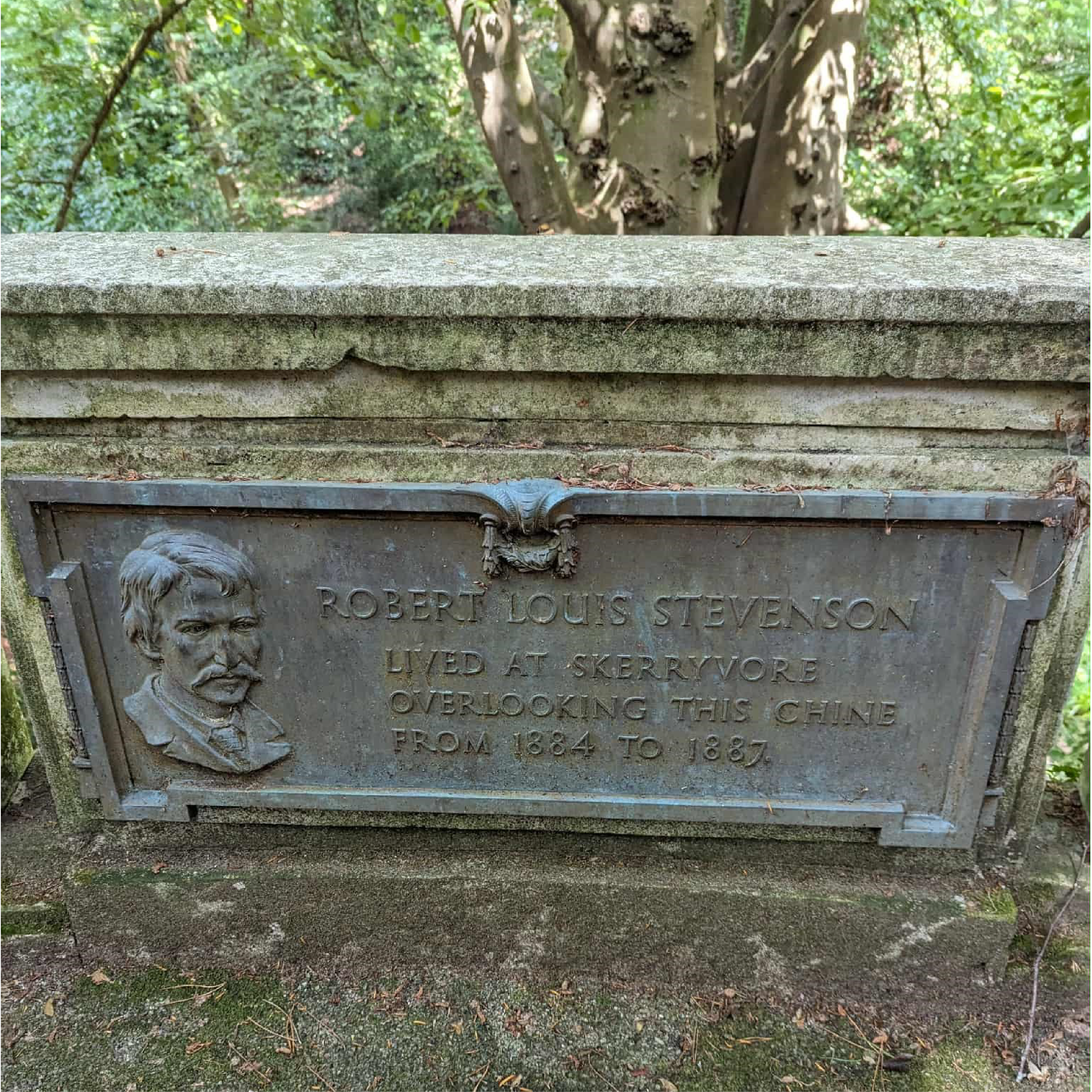 A stone plaque dedicated to the memory of Robert Louis Stevenson in Skerryvore gardens.