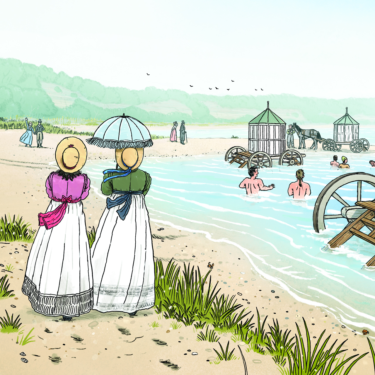 Two ladies walk along the beach as others swim in the sea near to mobile changing stations sitting in the surf.